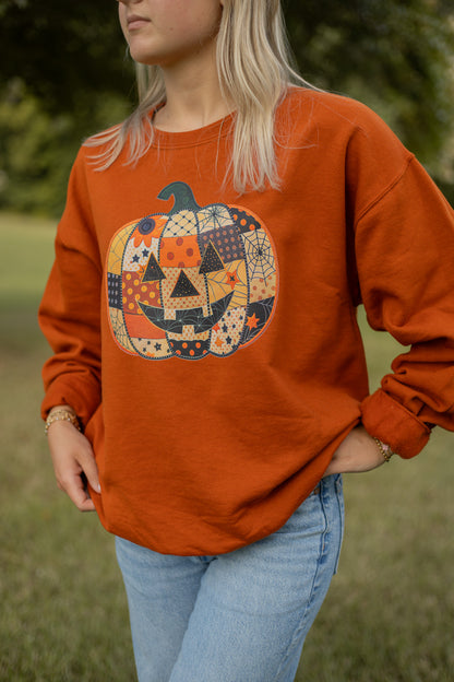 Patchwork Jack-o’-lantern Crewneck Sweatshirt